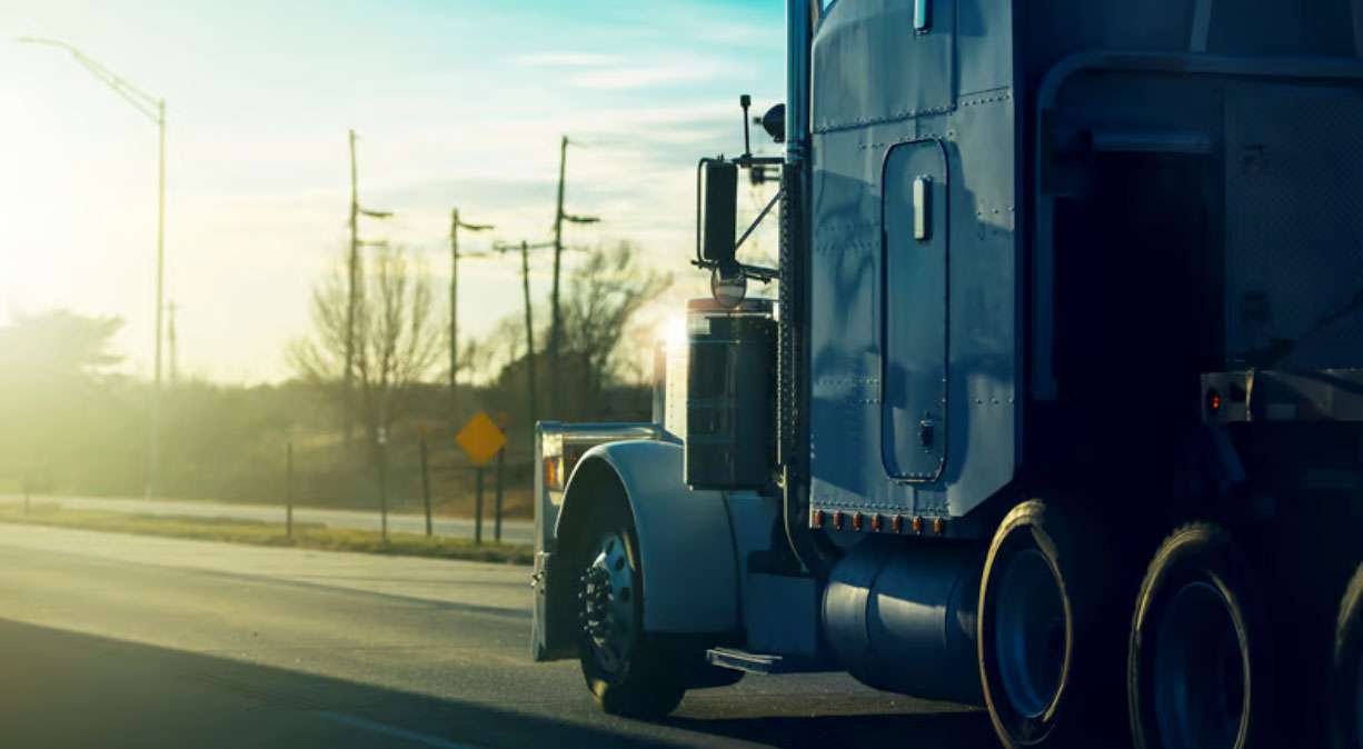 Semi-truck transporting high-value freight with dedicated transport and real-time tracking.
